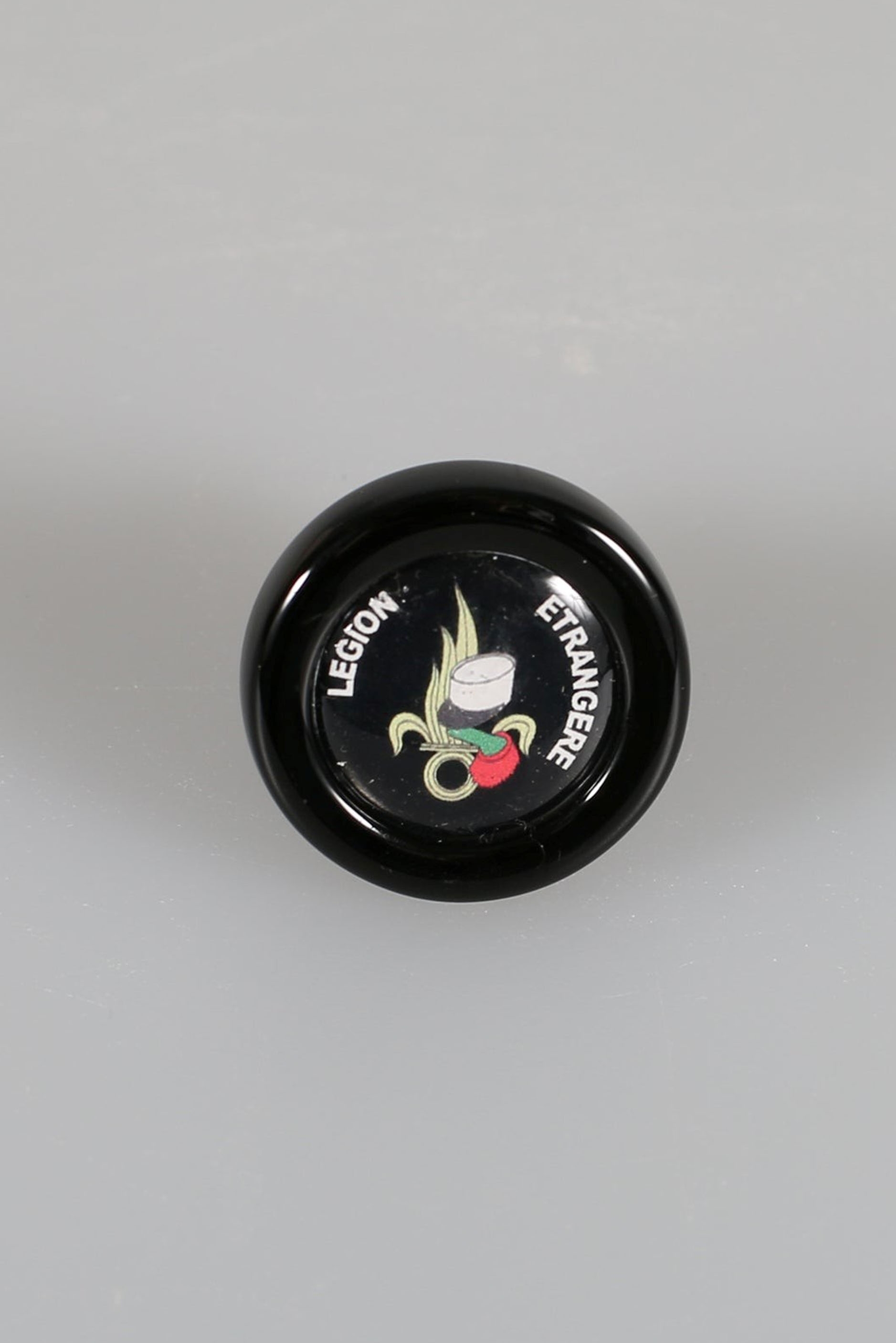 Glaspfropfen mit dem Logo der französischen Fremdenlegion
