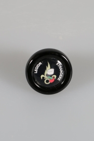 Glaspfropfen mit dem Logo der französischen Fremdenlegion